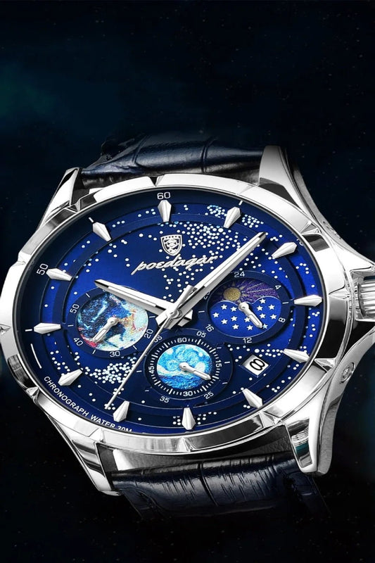 Luxury watches with a blue face and black leather strap on a dark background available in UK at Dellnux