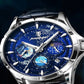 Luxury watches with a blue face and black leather strap on a dark background available in UK at Dellnux