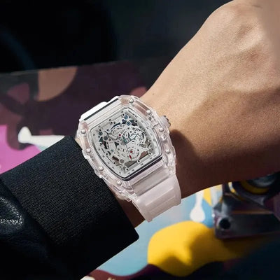 skeleton watch with a transparent case on a wrist against a colorful background available in UK at Dellnux